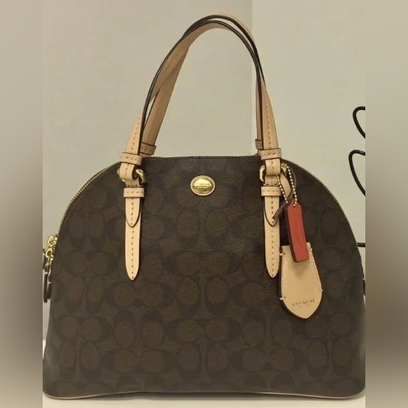 Coach Handbags - Coach- Dark brown Peyton SignatureDomed Satchel